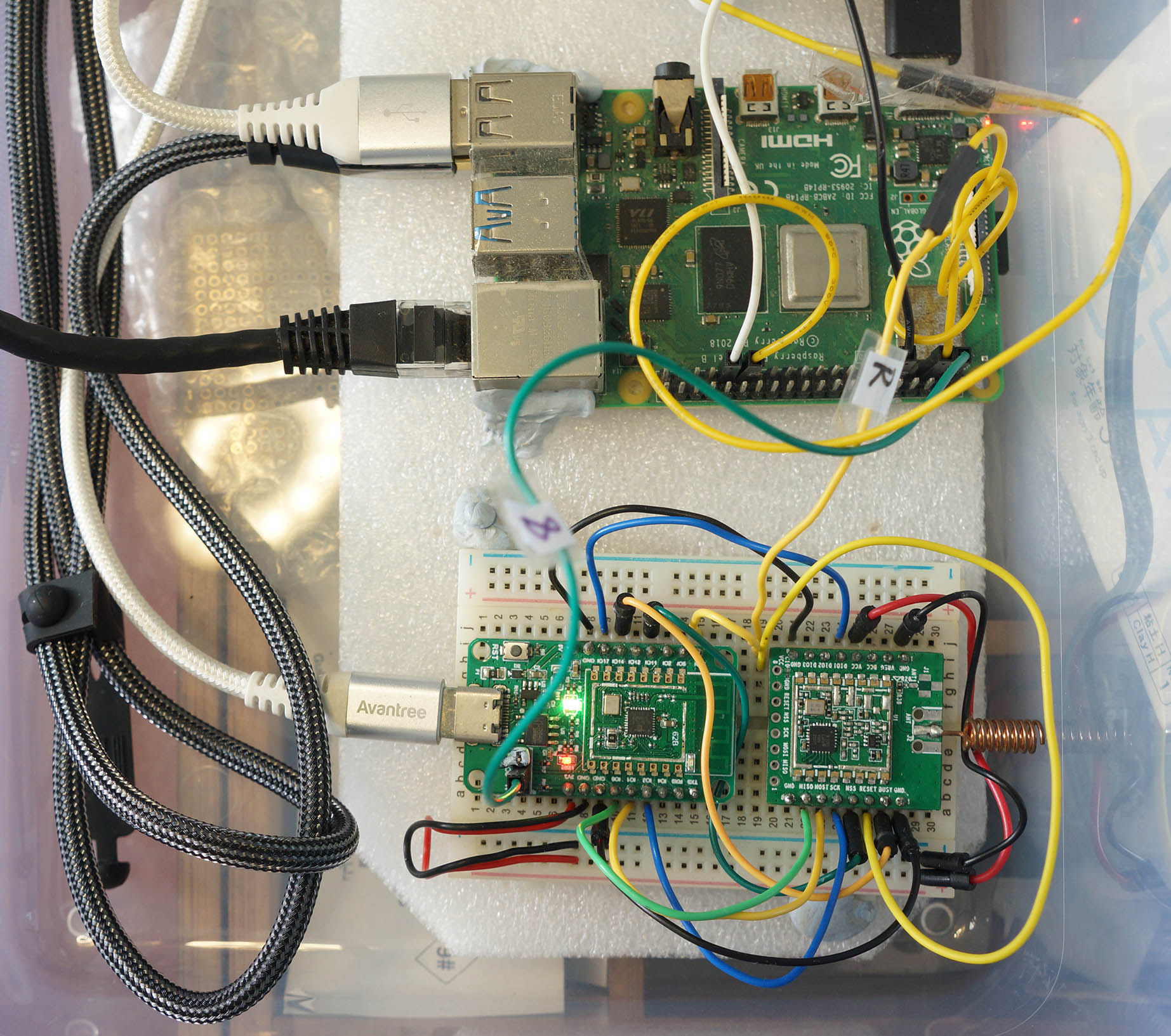 PineCone BL602 RISC-V Board (bottom) connected to Single-Board Computer (top) for Auto Flash and Test