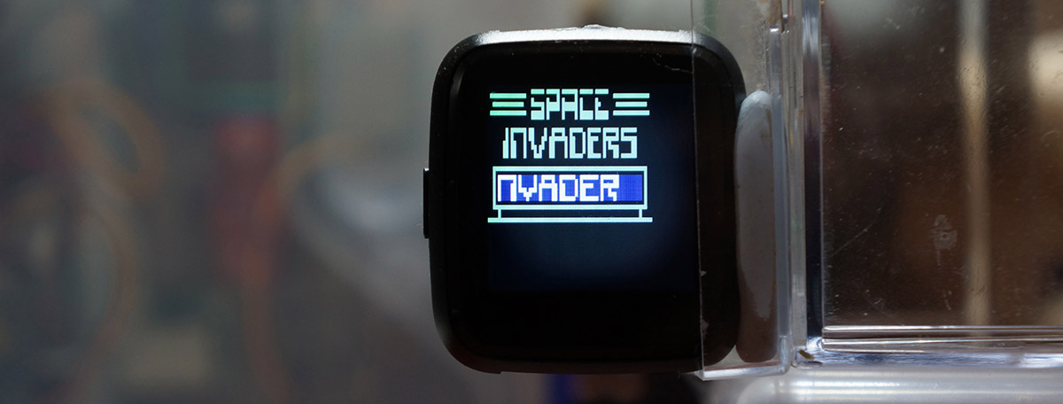 Space Invaders title screen in green